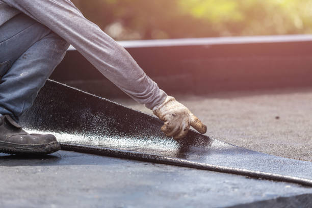 Professional Waterproofing technician working in Burt, NY